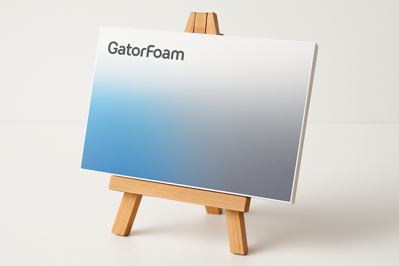 I want a foam board on a small easel that goes from a glue to grey color gradient throughout the board. Put the words “GatorFoam” on the top left in smaller font